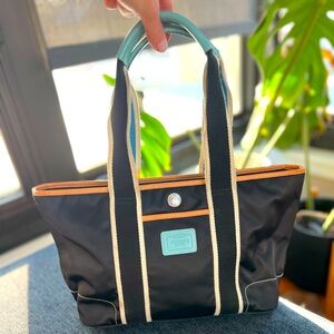Coach tote! Black nylon with contrast fabric straps, blue leather Coach patch.